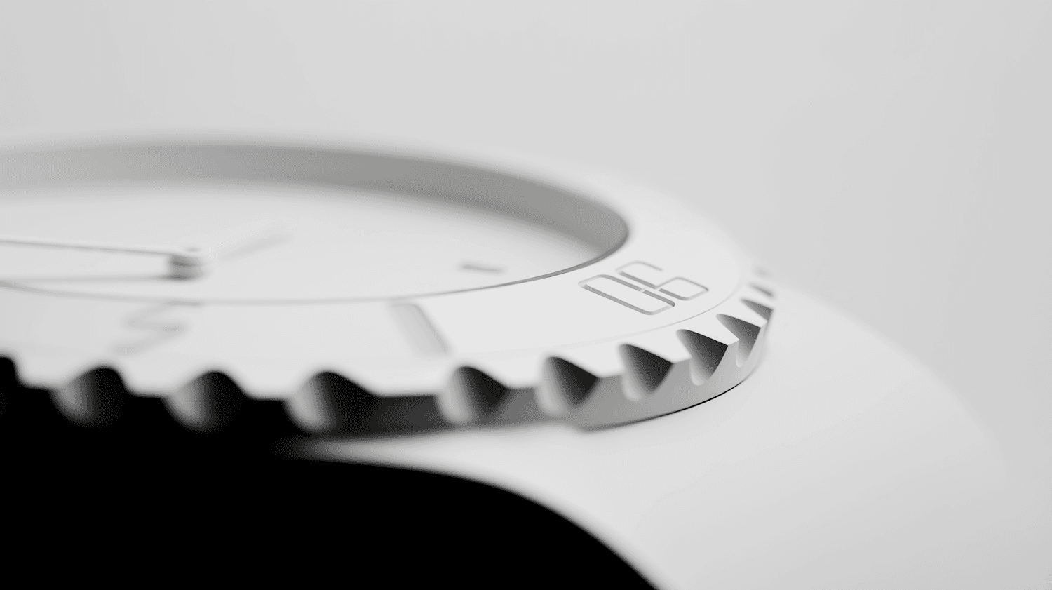 Extreme close-up of a white watch bezel with sculpted notches and an engraved numeral.